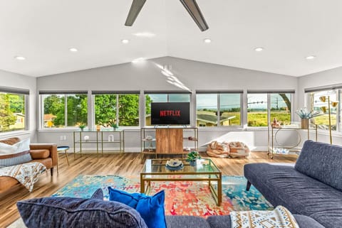 Spacious open floor plan with vaulted ceilings and panoramic mountain views