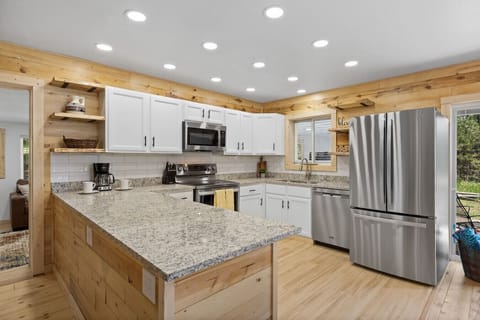 The heart of our home, this kitchen provides a welcoming space for cooking and creating memories.