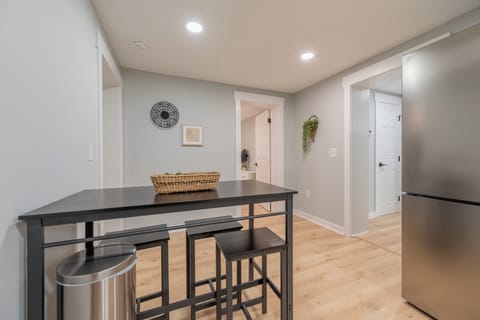 Enjoy casual dining or morning coffee at the cozy breakfast bar.