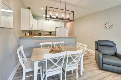 Dining Area: Modern dining space with stylish lighting and views, perfect for family meals!