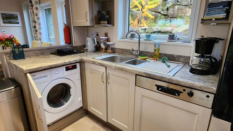 Fully equipped kitch- dishwasher, washing machine, full-size fridge-freezer etc.