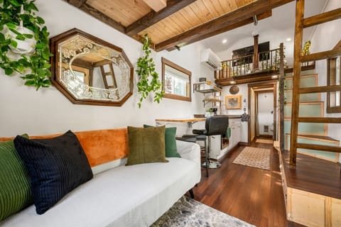 Sunlight, softness, and color combine for a joyful stay.
