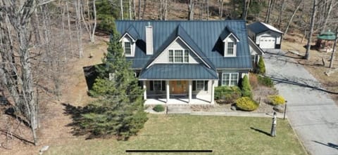 Our home at 100 Woodlily Court on a quiet street sitting on 2 acres of woods.