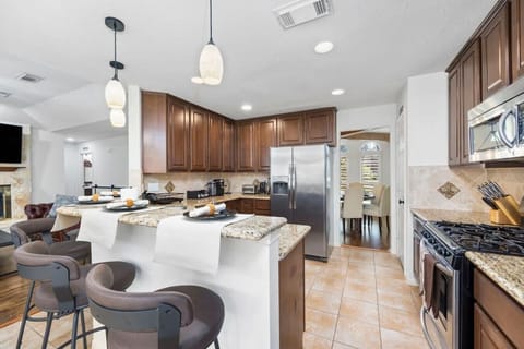 Kitchen island with comfortable bar seating — ideal for casual meals, morning coffee, or keeping the cook company