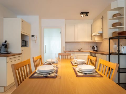 Furniture, Interior Design, Flooring, Floor, Kitchen, Wood, Countertop, Ceiling, Room, Major Appliance