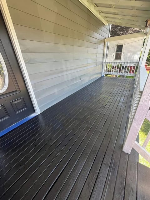 Freshly painted front porch before furnishings