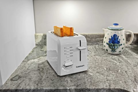 Kitchen: Contemporary amenities and ample counter space make cooking a joy in this kitchen.