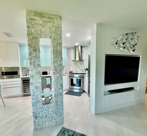 Open-concept living room, dining and kitchen