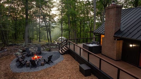 Emberwood is nestled on 6 wooded acres with tree-framed views of the Blue Ridge Mountains. 