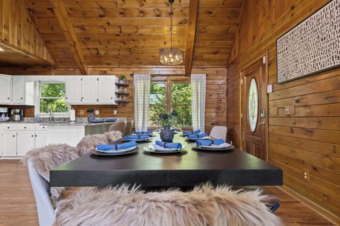 Our open-concept kitchen and dining area is designed for connection. Whip up your favorite meals in the fully equipped kitchen with modern appliances, then gather around the dining table for laughter, stories, and delicious food.