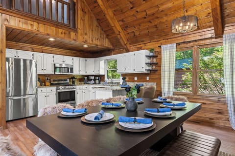 Our open-concept kitchen and dining area is designed for connection. Whip up your favorite meals in the fully equipped kitchen with modern appliances, then gather around the dining table for laughter, stories, and delicious food.