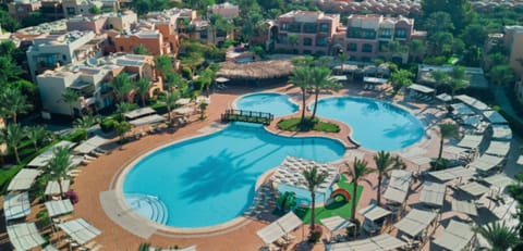 Glide over the resort pools and sun-soaked terraces below.
