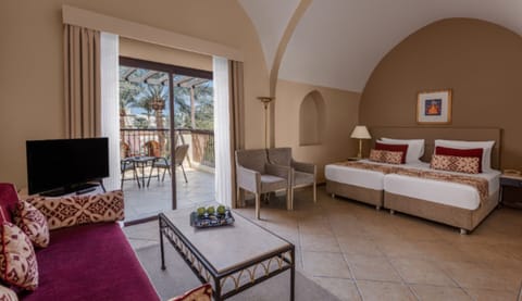 Stretch out in a spacious suite with lounge seating and daylight.