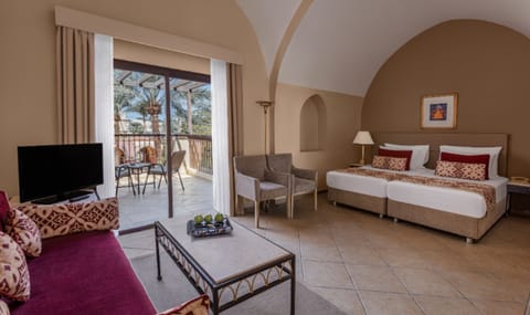 Stretch out in a spacious suite with lounge seating and daylight.