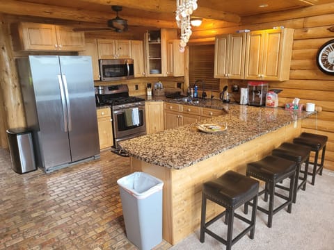 KITCHEN: The functional kitchen with all basic cook ware and even a coffeemaker a popcorn maker