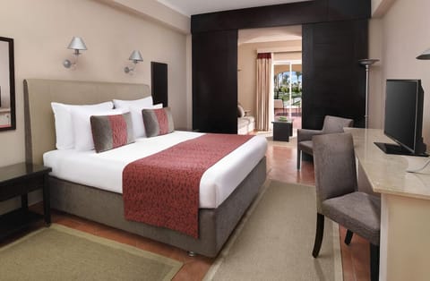 Relax in a spacious suite layout with cozy seating nook.