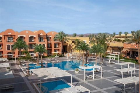 Soak up resort vibes with sweeping views over the pools.