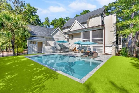 Private Pool with Secure Fenced Yard and Lush Astroturf