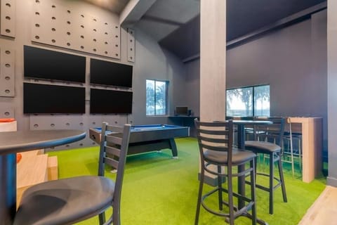 Relaxing lounge space featuring a pool table