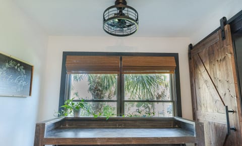 Kitchen with sitting isle and garden view