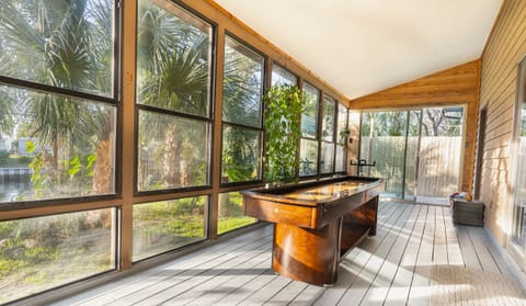 Large patio with games, jacuzzi and a lovely view