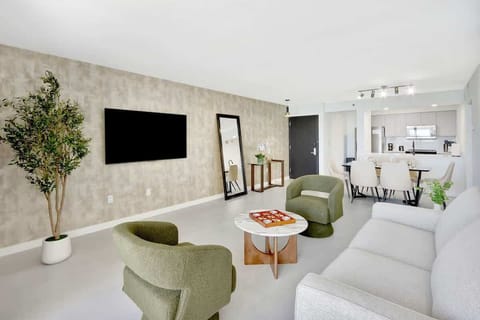 Relax in the bright and spacious living room, designed with comfort and modern flair.