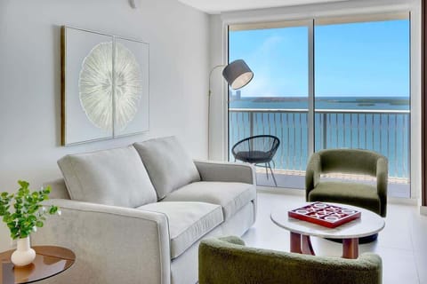 Relax in the bright and spacious living room, designed with comfort and modern flair.