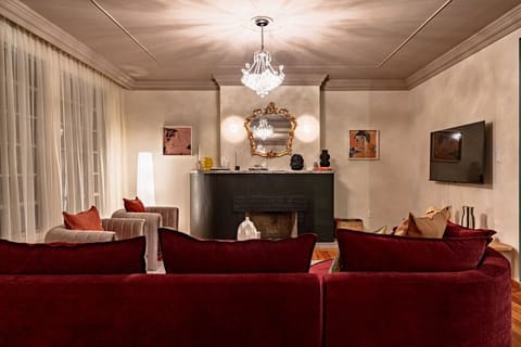 Relax in this spacious and plush lounge area with ambient lighting