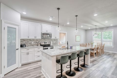 A symphony of light and space, this kitchen whispers tranquility. Modern elegance meets effortless functionality. 