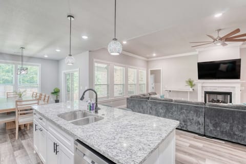 Clean lines and sophisticated style define this open-concept haven. A culinary masterpiece awaits.