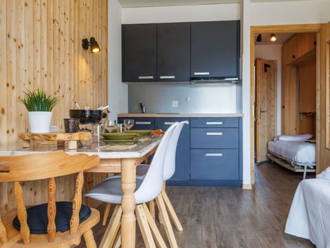 Furniture, Wood, Interior Design, Flooring, Floor, Room, Ceiling, Wood Stain, Hardwood, Chair