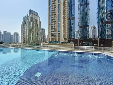 Poolside Paradise: Dive into relaxation at our stunning pool with a skyline view!