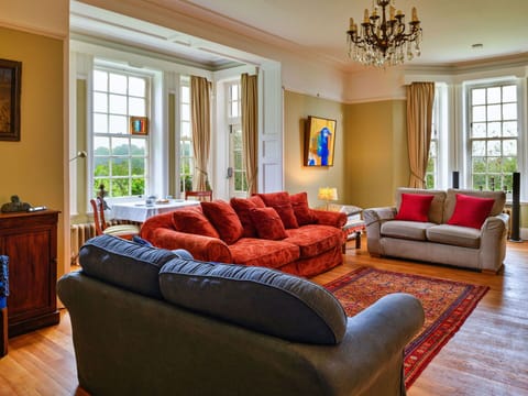 Furniture, Interior Design, Couch, Wood, Flooring, Living Room, Home, Floor, Room, Lighting