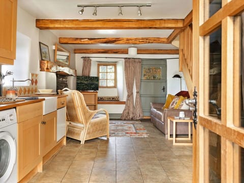 Furniture, Interior Design, Flooring, Wood, Ceiling, Floor, Room, Lighting, Home, Chair