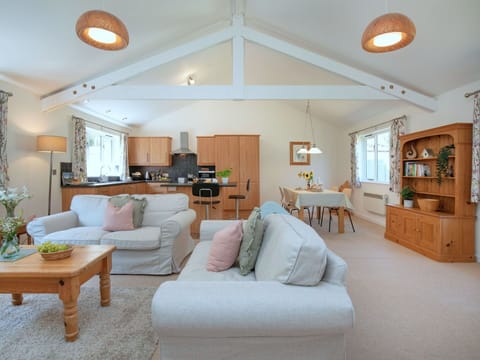 Furniture, Interior Design, Wood, Ceiling, Couch, Flooring, Textile, Room, Floor, Lighting