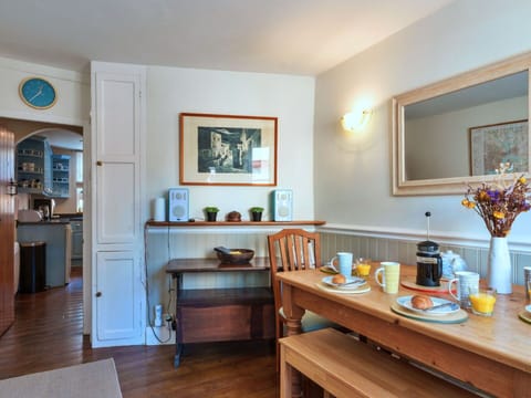 Furniture, Interior Design, Wood, Flooring, Room, Lighting, Kitchen & Dining Room Table, Floor, Cabinetry, Ceiling