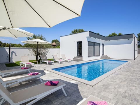 Swimming Pool, Composite Material, Resort, Concrete, Tile, Design, Outdoor Furniture, Estate, Villa, Shade