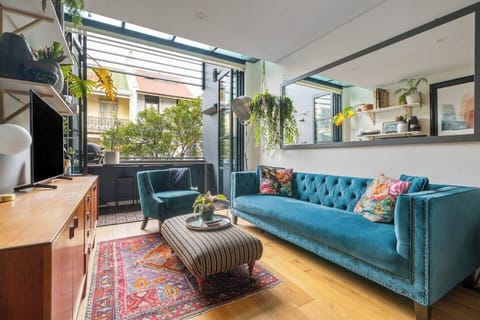 Relax on the comfortable, regal couch in front of the flat screen TV; or chill out at the balcony seating for two.