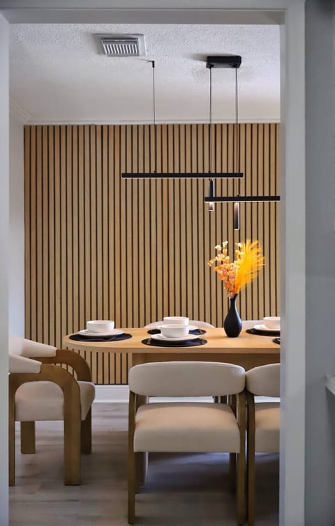 Elegant Dining Room | Modern Wood Accents • Statement Lighting