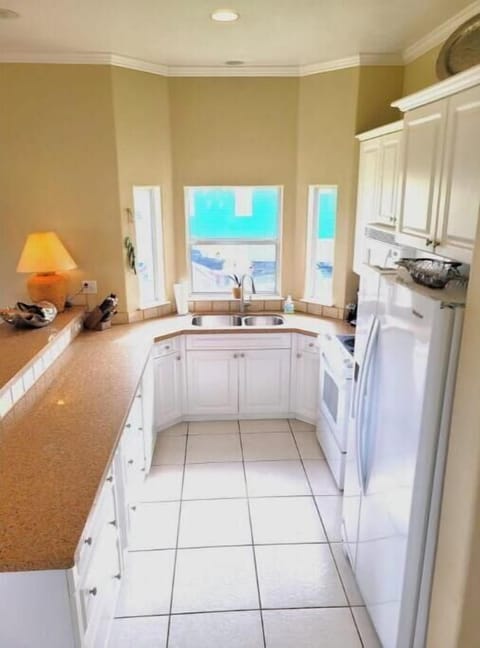 Fully equipped kitchen with all the essentials for cooking and dining.