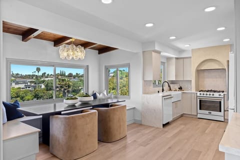 Gather for family-style meals or meetings in this open-concept setting