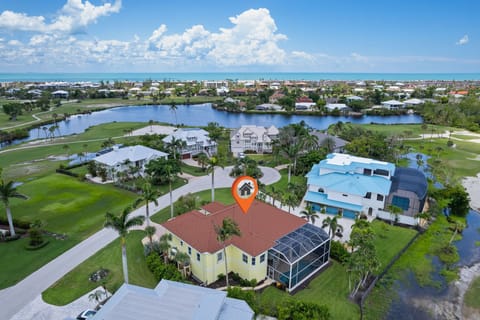 Beauty abounds in this executive class Beachview estate, featuring 4 bedrooms and baths, a heated pool/spa, and high end furniture and finishes