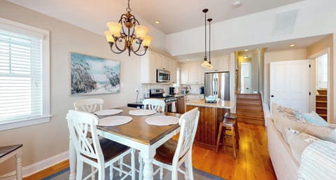 Kitchen area with table for entertaining guests.