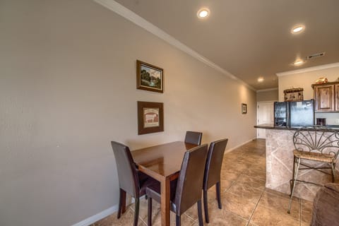 Dining room table has seating for 4 while the breakfast bar has seating for 3!