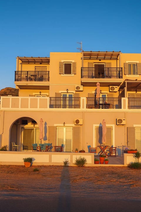 Mediterranean-Style Seaside Apartment Complex at Golden Hour