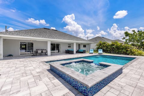Sparkling spa overlooking the canal with modern tile design