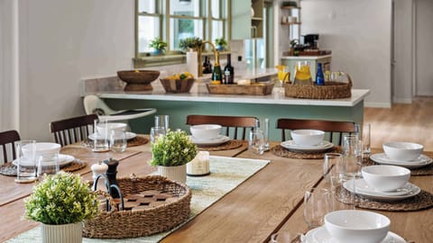 Gather around! This spacious dining area for 12 is made for big family meals, celebrations, and laughter-filled evenings. Because the more, the merrier!
