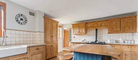 Fully-equipped kitchen that leads into the dining room