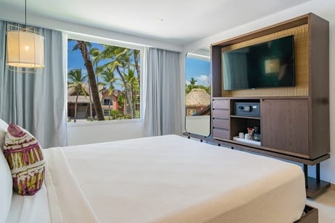 Wake up to palm views and relax with in-room TV