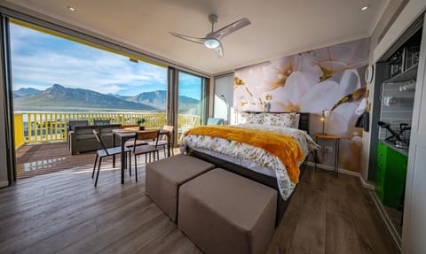 Glass Suite with mini kitchen, patio and 2 pop-out mattresses
